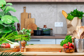 Food background. Healthy eating, cooking and blogging scene. Cutting board with strawberry, peas,...