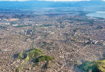 Aerial view of the Leopoldina suburbs, Penha, Olaria and Ramos and part of the Guanabara Bay, Rio de Janeiro, Brazil, Dec. 2022