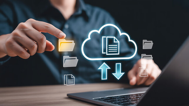 Person using laptop interacting with digital cloud data transfer icons