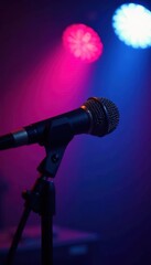Close-up of microphones under vibrant stage lighting , illuminated, concert