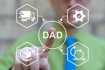 Disciplined Agile Delivery (DAD) Business concept. DAD Framework for Scalable Agile Solutions. Business person using virtual touch screen push abbreviation: DAD.
