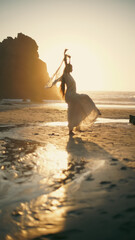 A girl in a sari dances against the backdrop of the ocean at sunset. Meditation.  Yoga. Soft focus