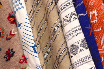 multicolored textile carpet in exposition on market