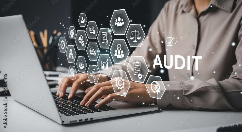 Poster Person typing on laptop with audit icons floating above keyboard in a digital environment
