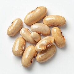 A high angle close up shot of a collection of tan colored cannellini beans isolated on white surface