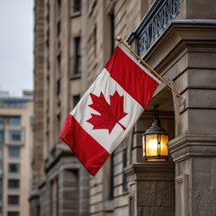 Canadian flag waving in front of a building, symbol of national pride and identity, for patriotic events and cultural representation