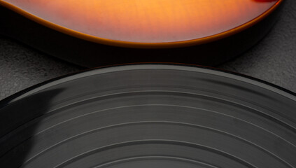 abstract musical background with vinyl disc and musical instruments with texture