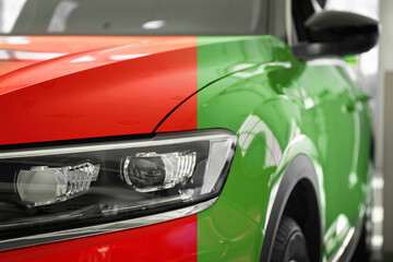 Modern red auto before and green after painting, closeup. Comparative collage of car repaint
