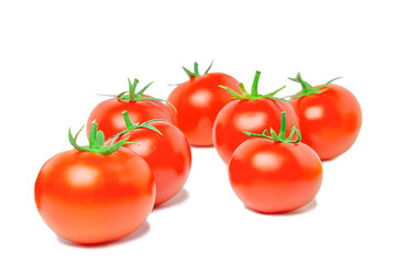 Group of ripe, juicy red tomato fruits with green twigs, illuminated by light highlights, isolated on a transparent white background, there are small translucent shadows. Blank for artworks, montage