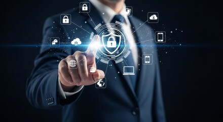 Man in suit pointing at digital security interface with cloud and device icons around the shield