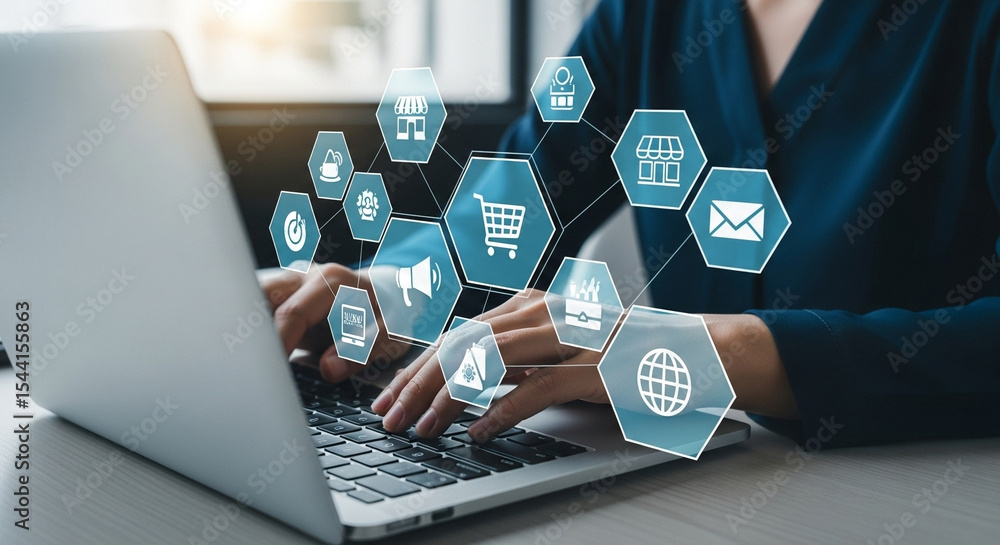 Aufkleber person typing on a laptop with e commerce icons floating above the keyboard and hands in view