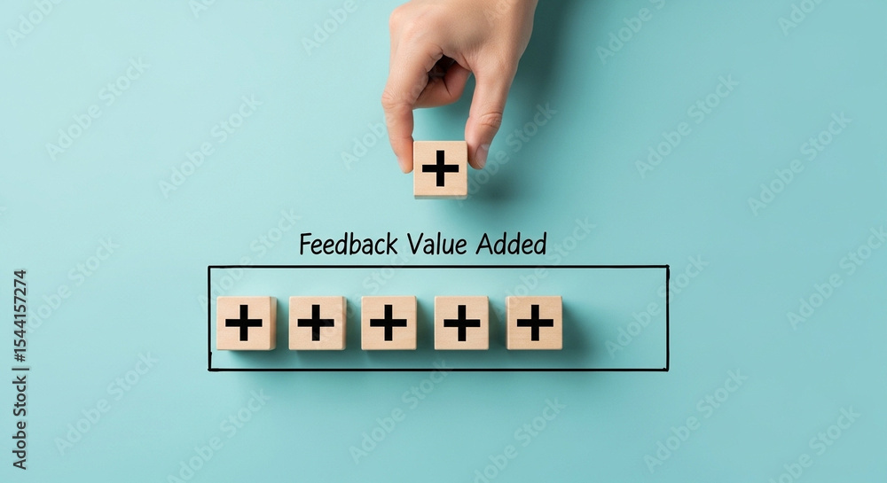 Fototapete hand placing a plus sign block above a row of plus sign blocks on a blue background concept image