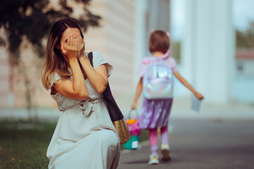 Emotional and Anxious Mother Sends Child to School. Mom in panic mode for little girl to start...