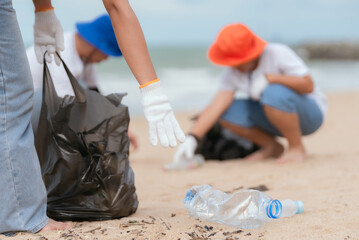 Beach cleanup event encourages community members to protect coastal environment while promoting teamwork and awareness