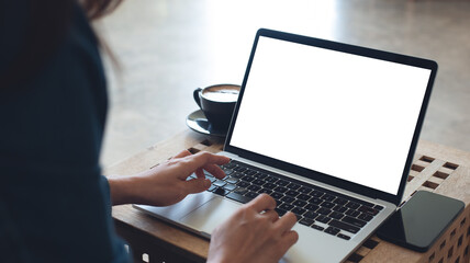 Laptop computer blank screen mockup. Woman working on laptop with empty screen for advertising,...