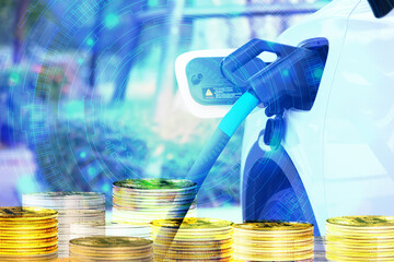 alternative energy concept.Close up of the Hybrid car electric charger station.with coins in the background.Business concept.