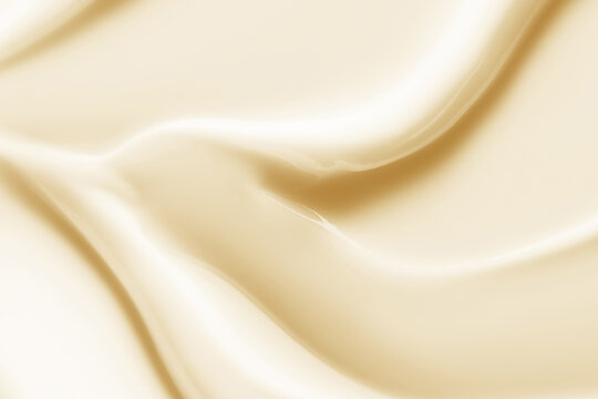 Cream texture. Skincare lotion, moisturizer, yellow creamy cosmetic product background