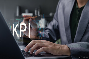 Businessman Analyzing KPI Data for Performance Review and Strategy