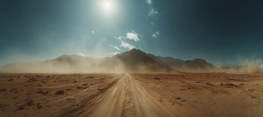 Fototapeta premium Vast panoramic desert landscape with distant mountains and a straight road leading to the horizon, featuring dust clouds, dry terrain, and atmospheric particles under a muted, cinematic tone