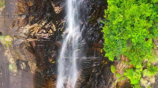 Beautiful waterfall in the rainforest view from above. Bambarakanda Falls, Sri Lanka.