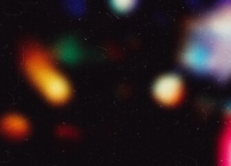 Designed film texture background with heavy grain, dust and a light leak Real Lens Flare Shot in Studio over Black Background. Easy to add as Overlay or Screen Filter over Photos overlay