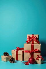 Fototapeta premium Zero waste Christmas presents Brown paper, red bow, blue backdrop , sustainable living, xmas