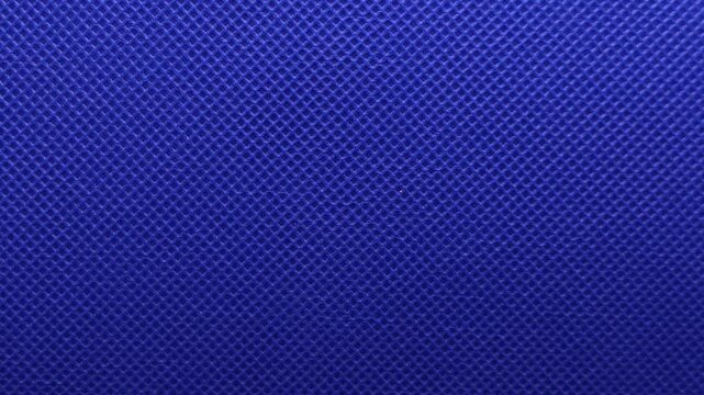 4K horizontal video, seamless geometric design with blue textured fabric patterns, vintage textile grids, mesh dots, and fiber surfaces, creating a decorative wallpaper backdrop and canvas illustratio