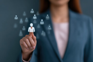 Businesswoman hand selecting virtual employee icon, recruitment and remote hiring concept, professional HR management