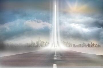 Street leading against cloudy sky