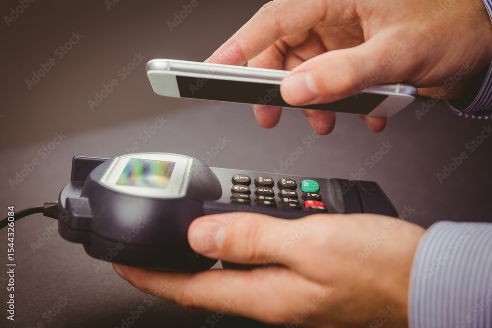 Poster man using smartphone to express pay