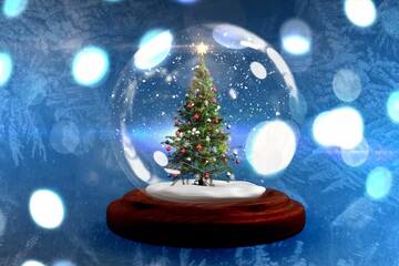 Christmas tree in snow globe