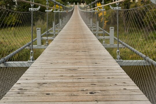 Fototapeta Wooden bridge at countryside