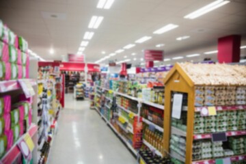 Products kept on shelves amidst aile