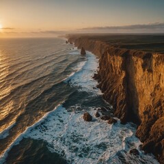 Write about standing at the edge of a cliff where the ocean stretches endlessly into a golden horizon