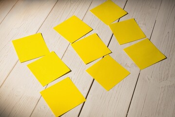 Yellow square shaped papers