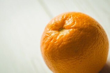 Orange fruit on wooden table