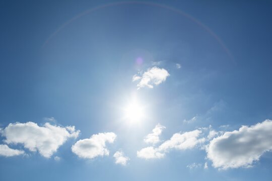 Fototapeta Low angle of cloudy sky with sunshine