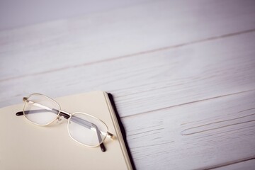 High angle view of golden eyeglasses