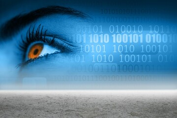 Eye with binary code over desert