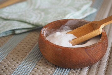baking soda and a cloth on a carpet 