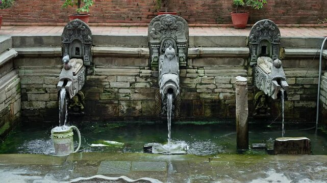 Ancient Dhunge dhara (hiti) in Patan Durbar Square