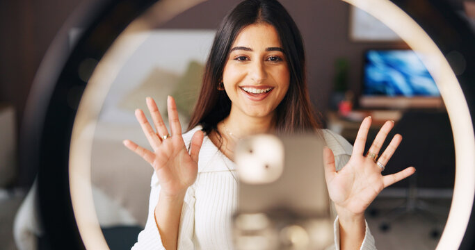 Podcast, ring light and smile with influencer woman in home for live broadcast or recording. Face, phone and streaming with happy content creator in apartment for instructions or recommendation