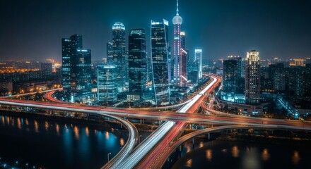 Obraz premium Night Lights of the City Stunning Urban Skyline and Highway Intersection