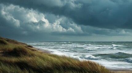 Dramatic storm clouds over north sea coastline with rough ocean waves and moody sky