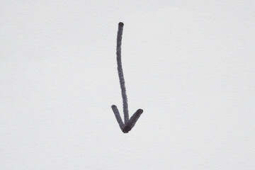 hand drawn arrow with black marker on white background
