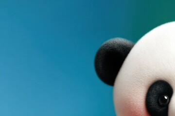 Closeup of Adorable Plush Panda Toy Against a Blue Background