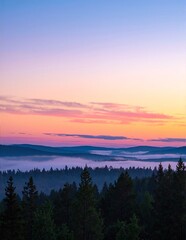 A breathtaking sunset view from the summit of Mount Washington, showcasing vibrant hues of orange, pink, and purple illuminating the sky and rugged landscape.