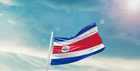 Costa Rica national flag waving with beautiful sky.