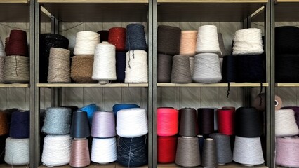 Multicolored Yarn Cones for Textile Production. Assorted Yarn Cones in Various Shades and Textures.