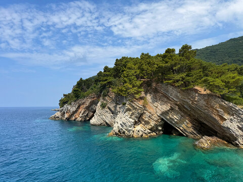 Adriatic sea and layered rocks in Montenegro Budva riviera